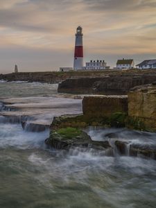 Preview wallpaper lighthouse, rocks, sea, waves, landscape