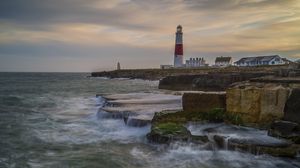 Preview wallpaper lighthouse, rocks, sea, waves, landscape