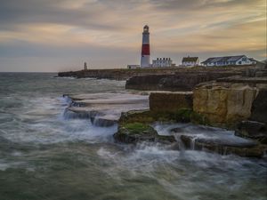 Preview wallpaper lighthouse, rocks, sea, waves, landscape