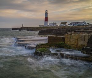 Preview wallpaper lighthouse, rocks, sea, waves, landscape