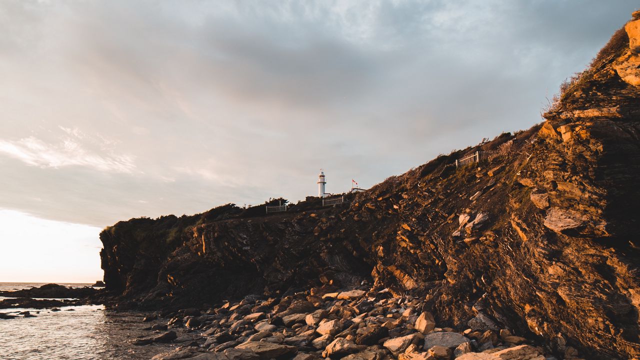 Wallpaper lighthouse, rocks, stones, cliff
