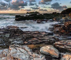 Preview wallpaper lighthouse, rocks, stones, coast, sea