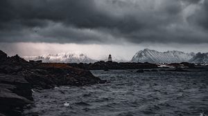 Preview wallpaper lighthouse, rocks, water, mountains