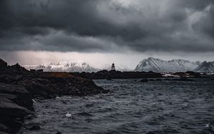 Preview wallpaper lighthouse, rocks, water, mountains