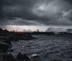 Preview wallpaper lighthouse, rocks, water, mountains