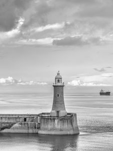 Preview wallpaper lighthouse, sea, bw, horizon, sky, clouds