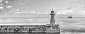 Preview wallpaper lighthouse, sea, bw, horizon, sky, clouds