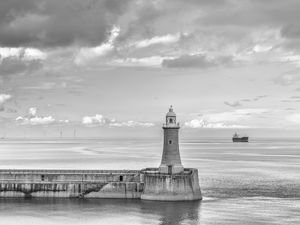 Preview wallpaper lighthouse, sea, bw, horizon, sky, clouds