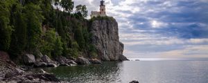 Preview wallpaper lighthouse, sea, cliff, rock, shore