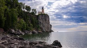 Preview wallpaper lighthouse, sea, cliff, rock, shore