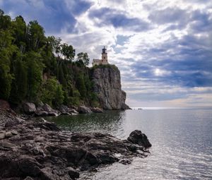 Preview wallpaper lighthouse, sea, cliff, rock, shore