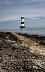 Preview wallpaper lighthouse, sea, coast, sky
