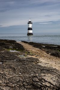 Preview wallpaper lighthouse, sea, coast, sky
