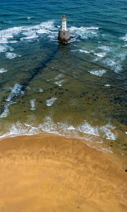 Preview wallpaper lighthouse, sea, foam, waves, shore, bottom