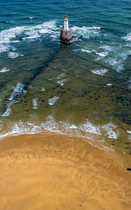 Preview wallpaper lighthouse, sea, foam, waves, shore, bottom