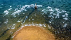 Preview wallpaper lighthouse, sea, foam, waves, shore, bottom