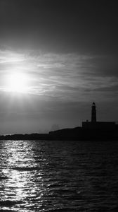 Preview wallpaper lighthouse, sea, glare, rays, dark