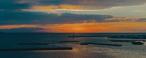 Preview wallpaper lighthouse, sea, pier, horizon, sunset