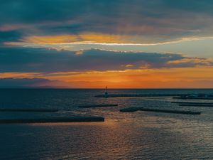 Preview wallpaper lighthouse, sea, pier, horizon, sunset