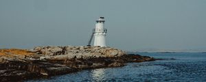 Preview wallpaper lighthouse, sea, rocks, shore