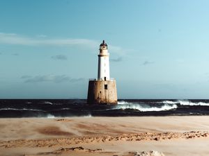 Preview wallpaper lighthouse, sea, sand, surf, waves, horizon