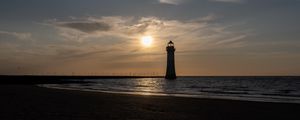 Preview wallpaper lighthouse, sea, shore, dark, sun