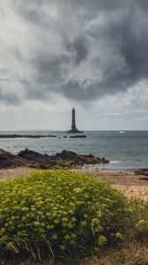 Preview wallpaper lighthouse, sea, shore, bush, stones