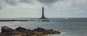 Preview wallpaper lighthouse, sea, shore, bush, stones