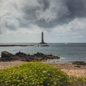 Preview wallpaper lighthouse, sea, shore, bush, stones