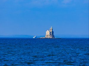 Preview wallpaper lighthouse, sea, sky, waves, horizon