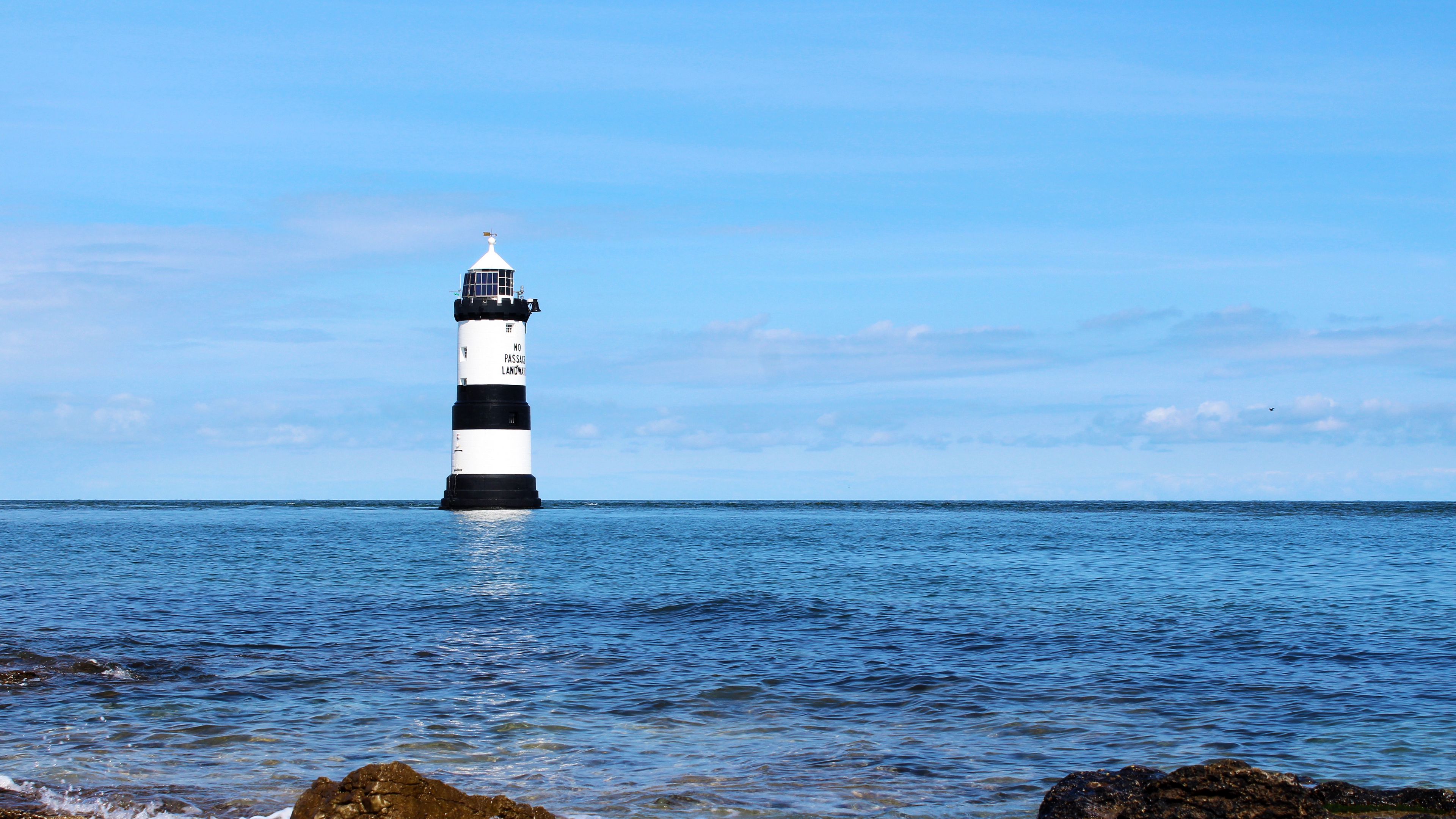 Download wallpaper 3840x2160 lighthouse, sea, sky 4k uhd 16:9 hd background