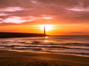 Preview wallpaper lighthouse, sea, sunset, dusk, coast