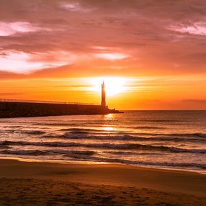 Preview wallpaper lighthouse, sea, sunset, dusk, coast