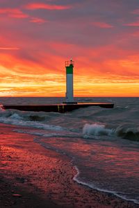 Preview wallpaper lighthouse, sea, sunset, waves, beach