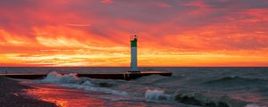 Preview wallpaper lighthouse, sea, sunset, waves, beach