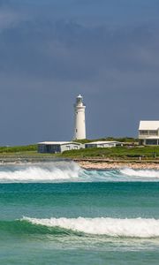 Preview wallpaper lighthouse, sea, waves, buildings