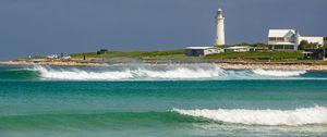 Preview wallpaper lighthouse, sea, waves, buildings