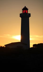 Preview wallpaper lighthouse, silhouette, sunset, dark