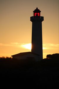 Preview wallpaper lighthouse, silhouette, sunset, dark