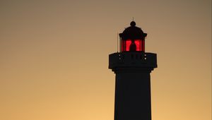 Preview wallpaper lighthouse, silhouette, sunset, dark