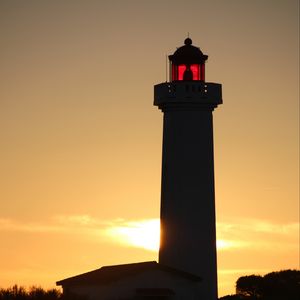 Preview wallpaper lighthouse, silhouette, sunset, dark