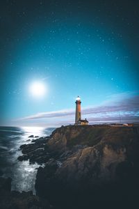 Preview wallpaper lighthouse, starry sky, shore, pescadero, united states