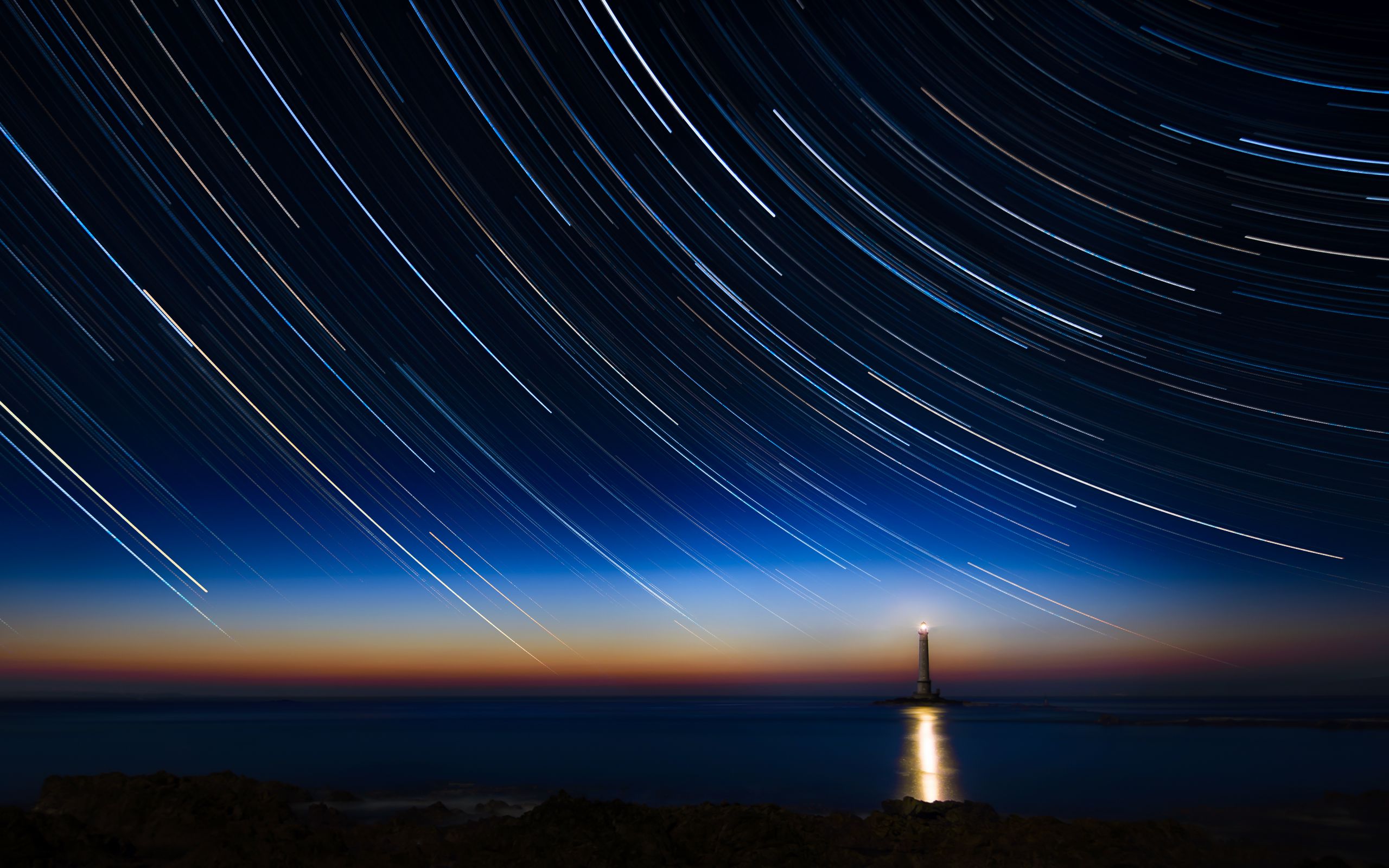 Download wallpaper 2560x1600 lighthouse, stars, freezelight, sea, night