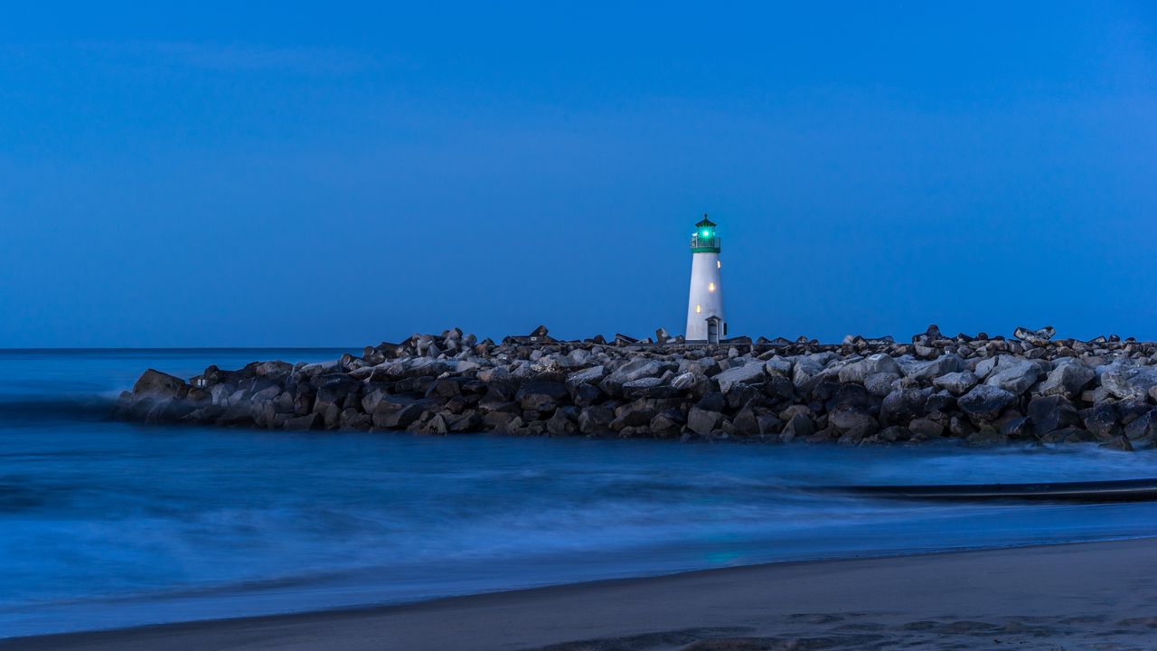 Wallpaper lighthouse, stones, sea, shore, sky
