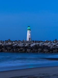 Preview wallpaper lighthouse, stones, sea, shore, sky