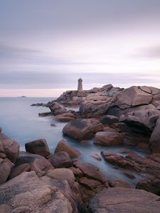 Preview wallpaper lighthouse, stones, sea, rocks