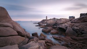 Preview wallpaper lighthouse, stones, sea, rocks
