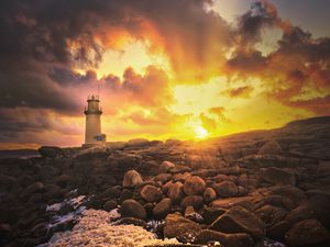 Preview wallpaper lighthouse, stones, shore, clouds