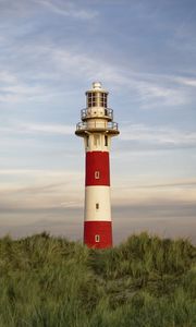 Preview wallpaper lighthouse, structure, grass, striped