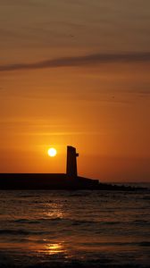 Preview wallpaper lighthouse, sunset, sun, sea, horizon